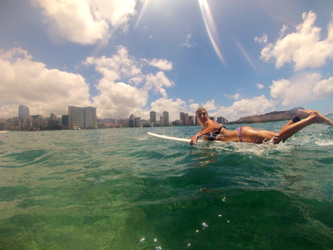 JOYLN'S Robin Lang surfing