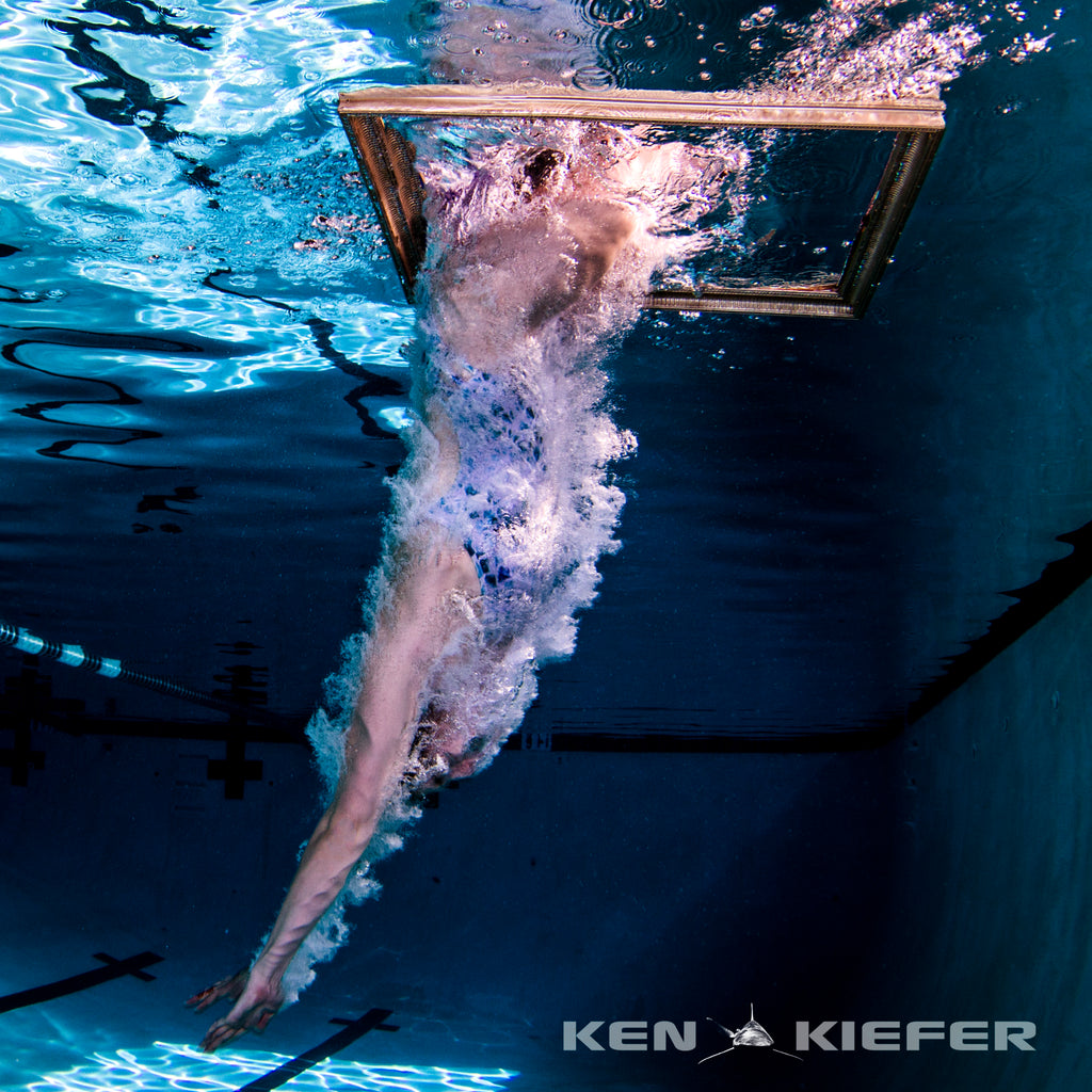 underwater photo of a woman swimmer in a JOLYN swimsuit