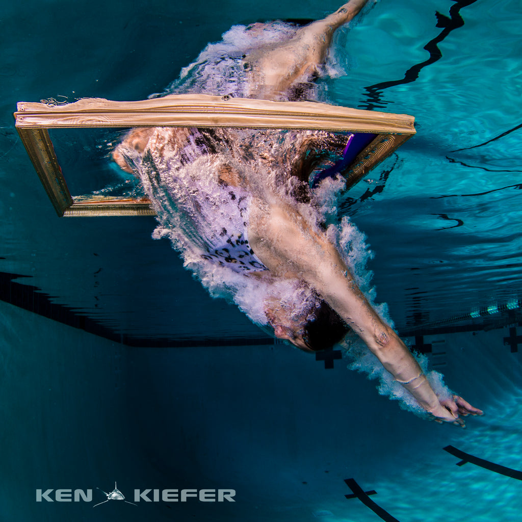 underwater photo of a woman swimmer in a JOLYN swimsuit