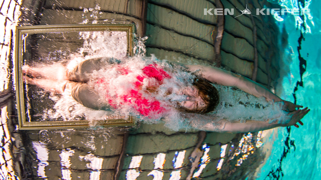 underwater photo of a woman swimmer in a JOLYN swimsuit