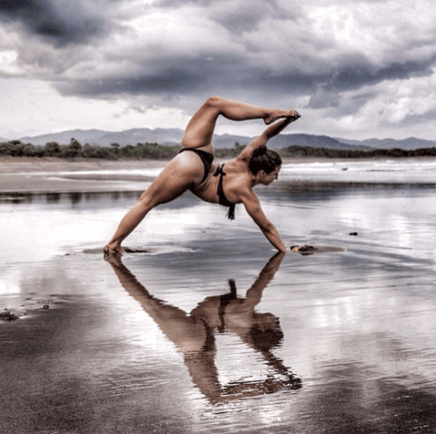 Irene Pappas, yoga moves on the beach