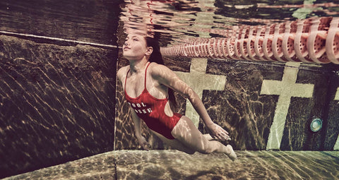 a woman in a JOLYN bikini, underwater