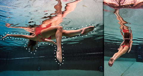 a woman in a JOLYN one piece swimsuit, underwater