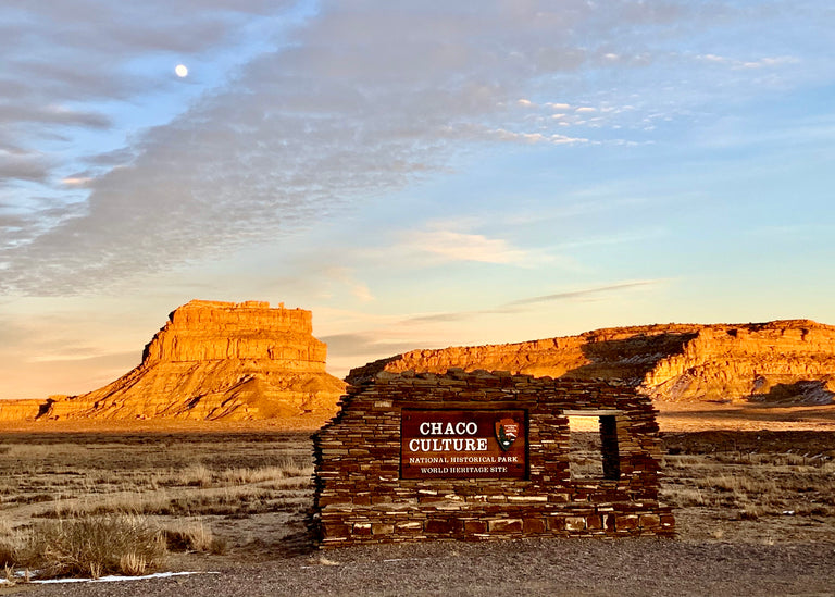 Chaco Culture National Historical Park sign and Fajada Butte