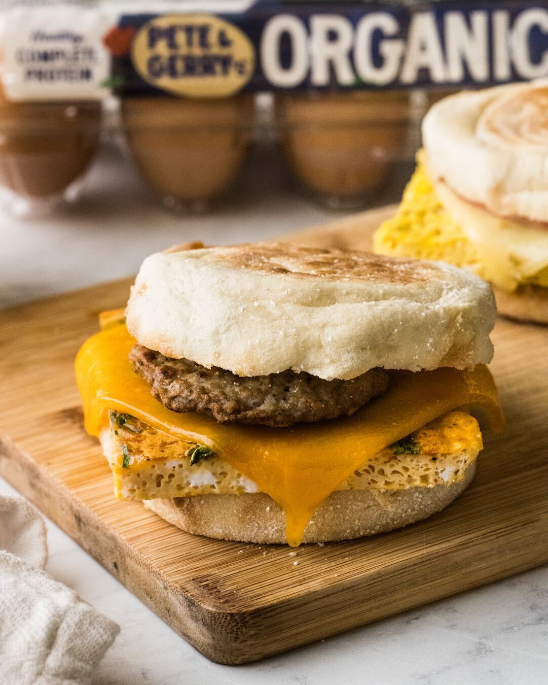 Freezer breakfast sandwiches made with easy sheet pan scrambled eggs mixed in with your favorite jarred salsa. | peteandgerrys.com