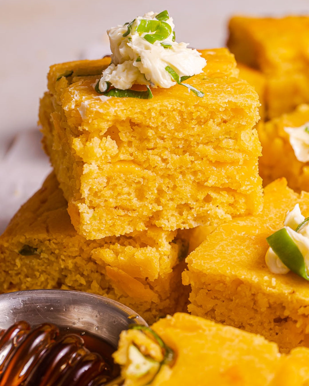 A sweet and spicy recipe for cheddar jalapeno cornbread and homemade scallion butter. | peteandgerrys.com