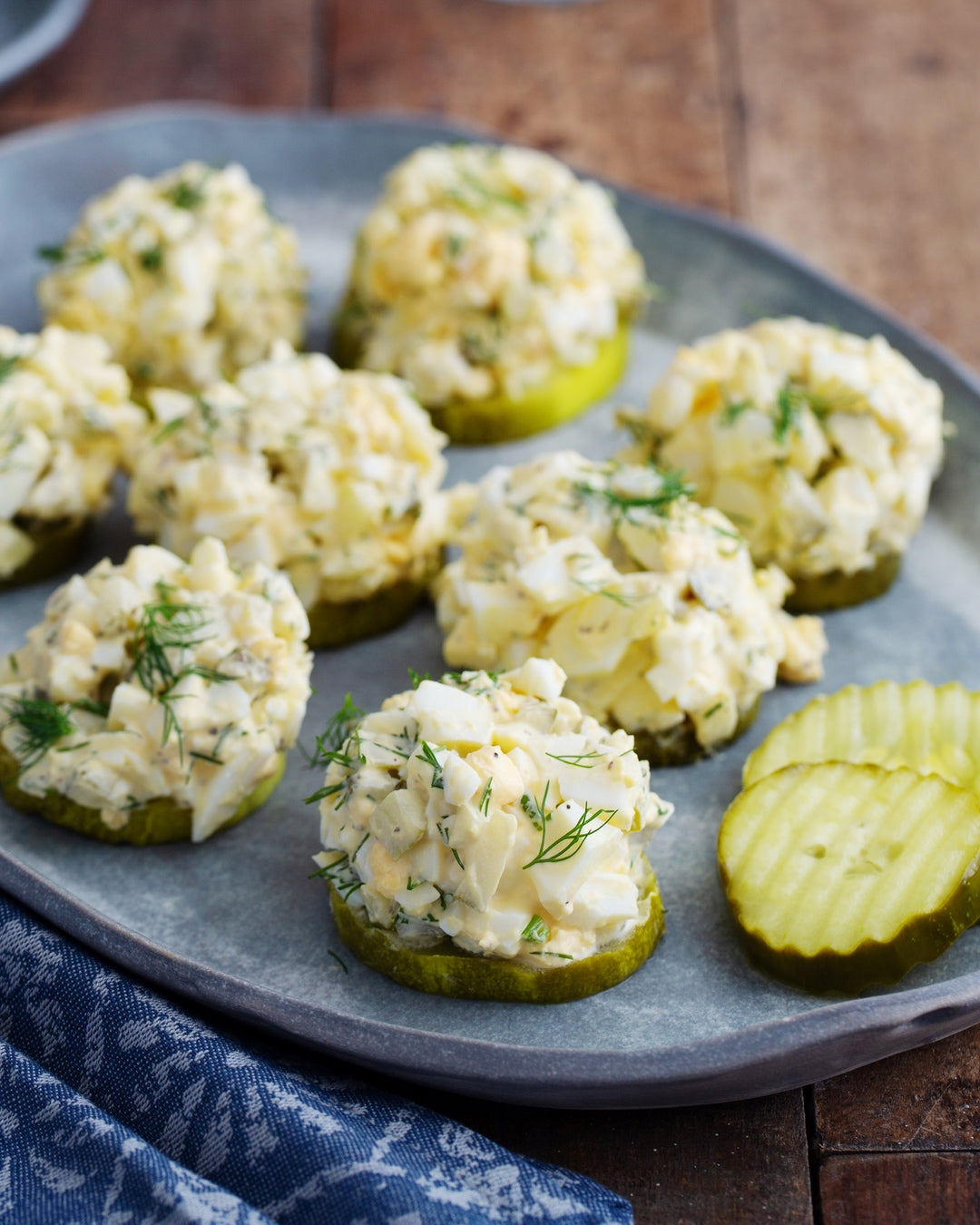 A simple, low-carb recipe for keto egg salad made with dill pickles and served on tangy dill pickle chips. | peteandgerrys.com