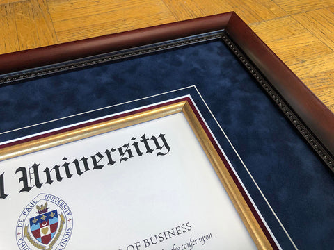 diploma in a double matte, navy and gold