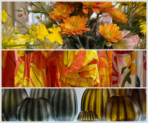 Flowers, fabric and glass vases with orange, yellow, olive colours