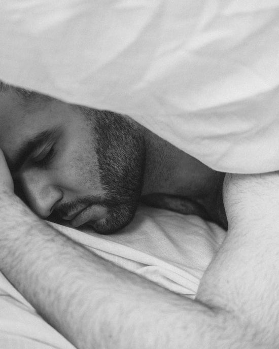 Man with beard resting peacefully