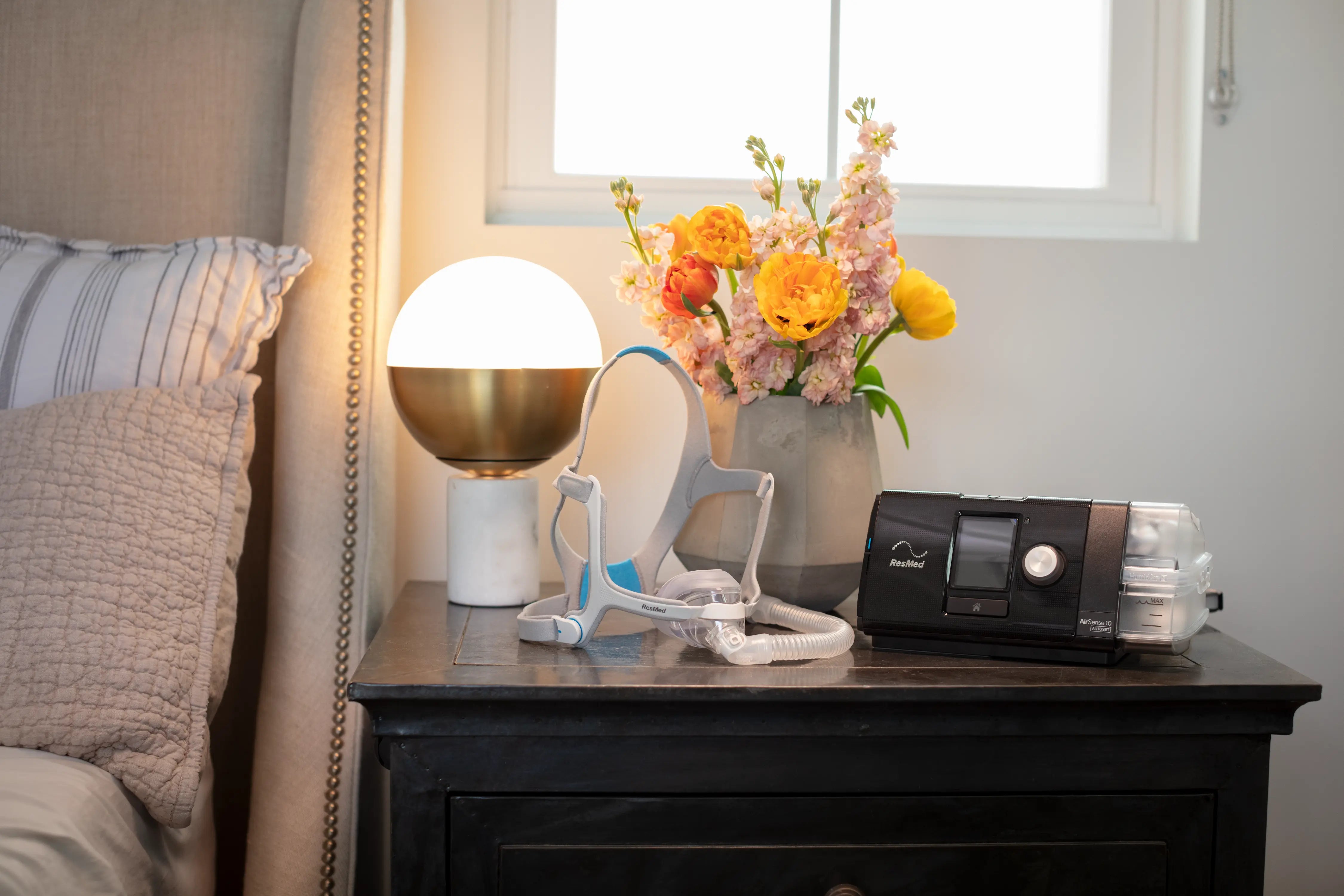 A cpap mask and machine just in the table