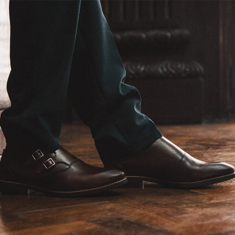 The image contains a man wearing a Sandro Moscoloni Premium Monk Strap Dress Shoe