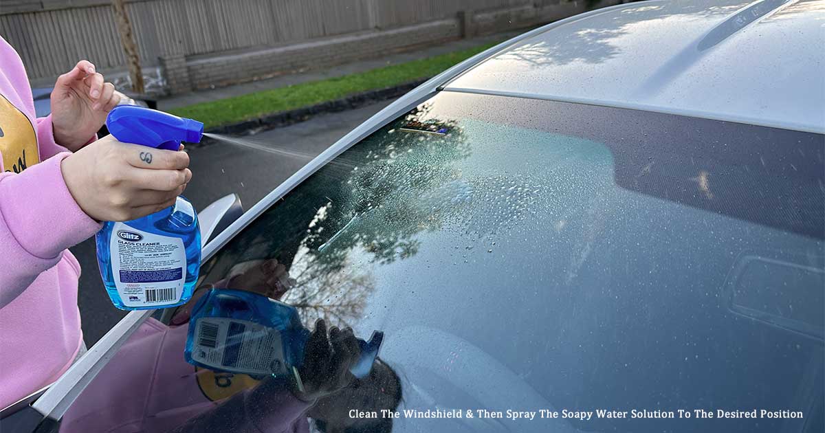 Spraying soapy water to a Toyota 86's front window