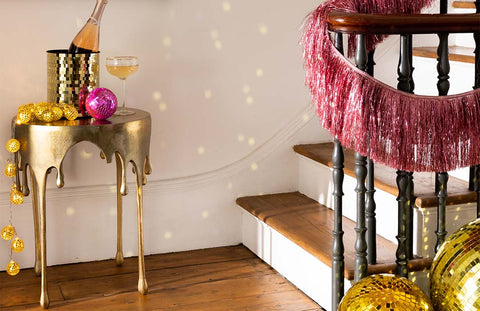 PINK STAIR GARLAND AND GOLD DRIP TABLE WITH CHAMPAGNE BUCKET