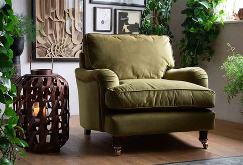 Lifestyle image of a Rockett St George green armchair.