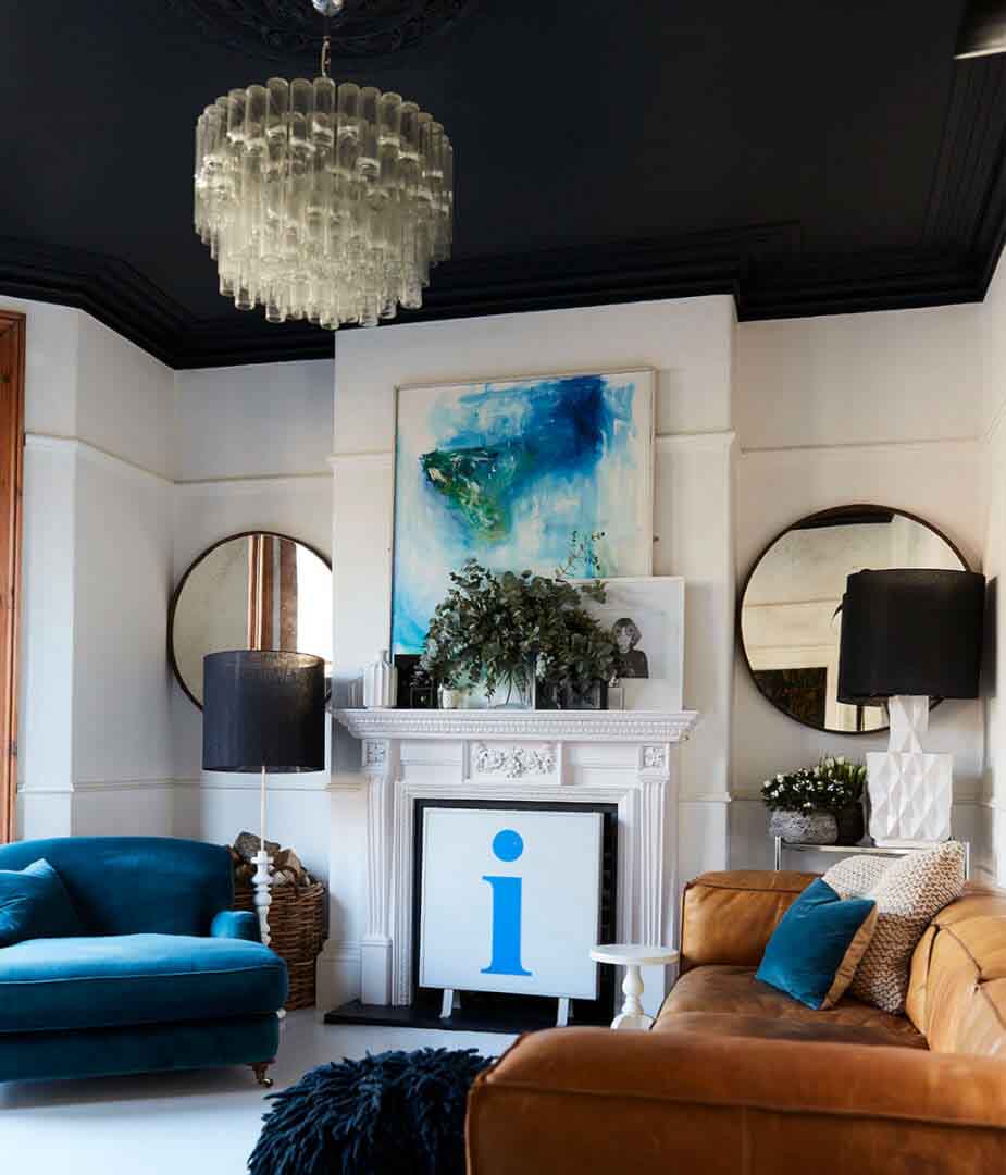 White living room with black ceiling