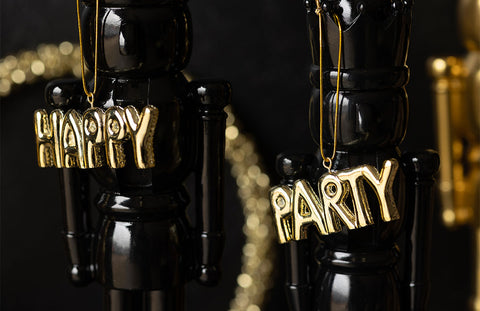 gold word decorations 'happy and 'party'