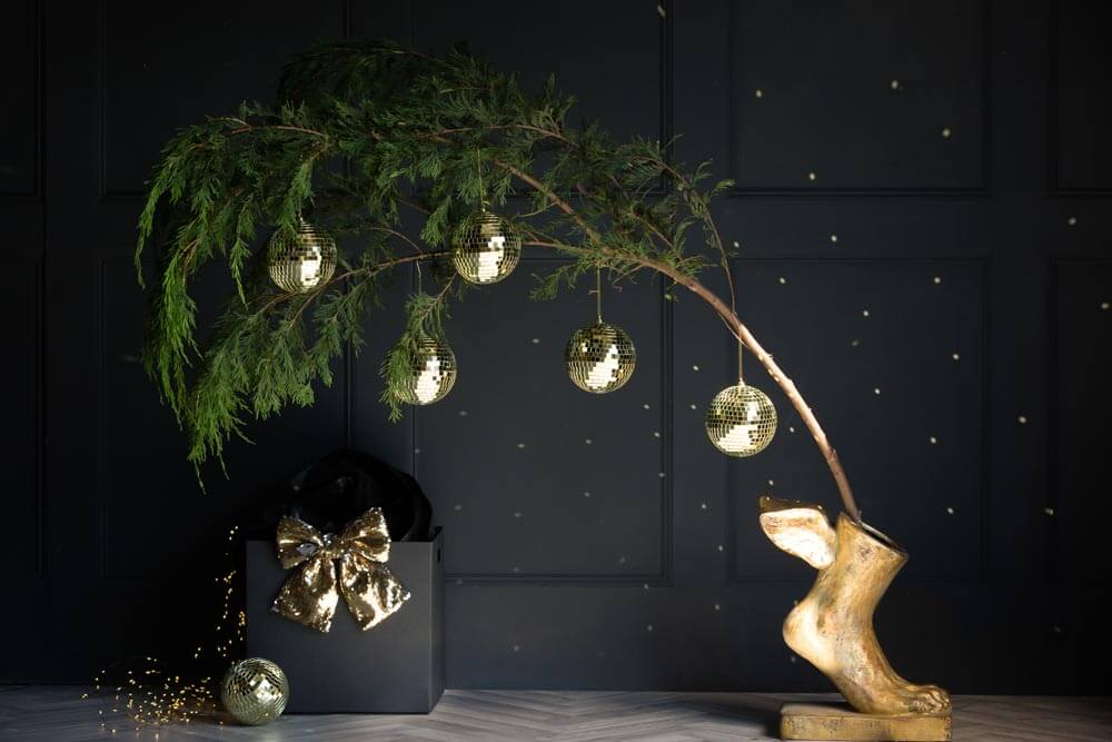 planter with brand and disco baubles
