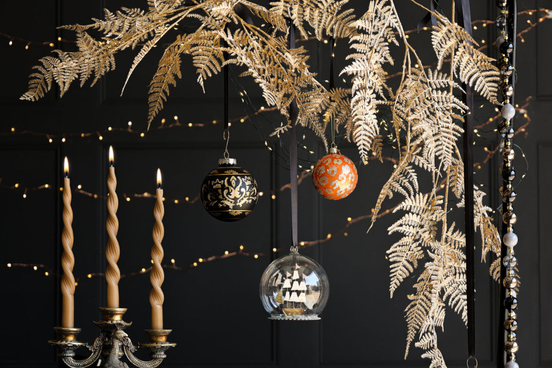 table setting with candles and decorations