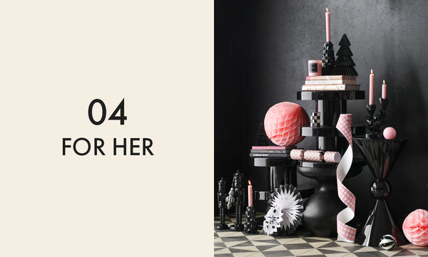 Gift ideas for Her including a gift tower image with gifts in pink and black.