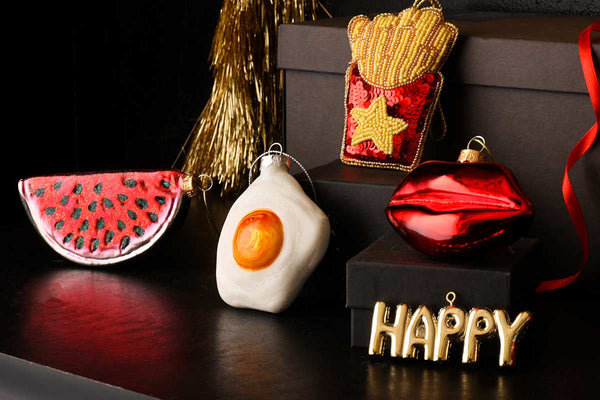 Watermelon, fried egg, chips, lips and happy decoration.