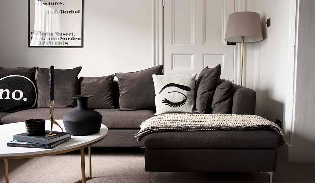 grey sofa with beaded yes no cushion