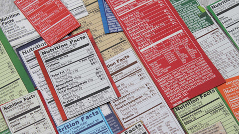 selection of food ingredient and nutrition labels showing quantities of sugar