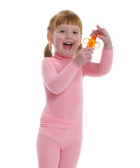 Happy little girl wearing base layers in pink