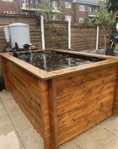 raised garden pond in 70mm logs