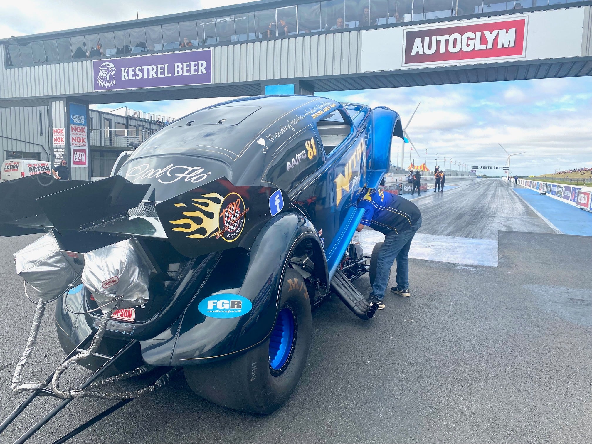 Nitro Bug Funny Car on the strip at Santa Pod raceway.