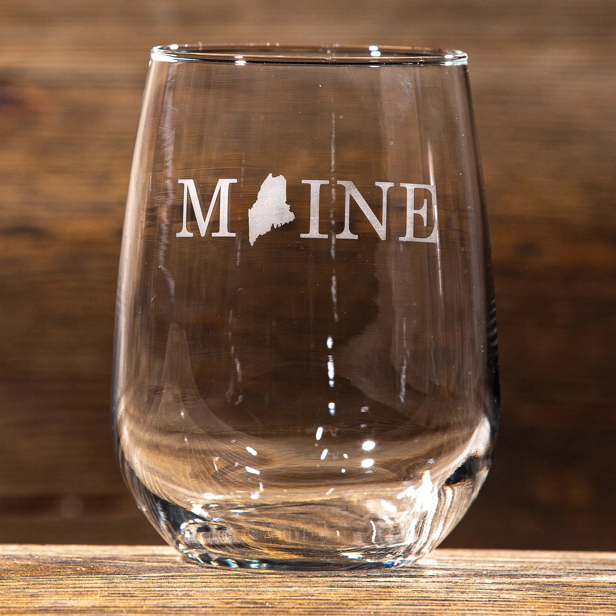 https://cdn.shopify.com/s/files/1/0705/4783/3109/products/ReclaiMEd_Sign_Co_Stemless_Wine_Glass_Etched_Maine.webp?v=1703855810