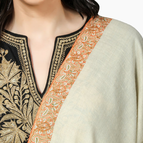 Kashmiri Pashmina shawl worn by a woman over a Kashmiri Cheran with Embroidery on borders of the Shawl 