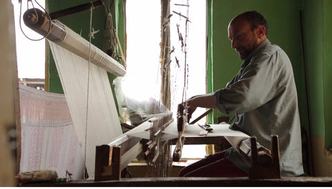 A Kashmiri Artisan weaving Pashmina shawls fabric