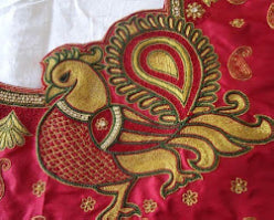Closeup view of Aari embroidery, showcasing the meticulous needlework and intricate patterns created through this traditional and skilled technique.