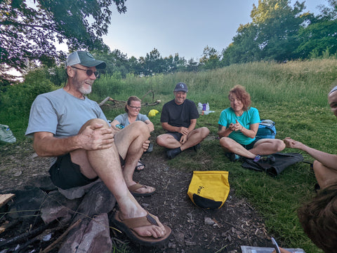 Hikers playing games in the grass