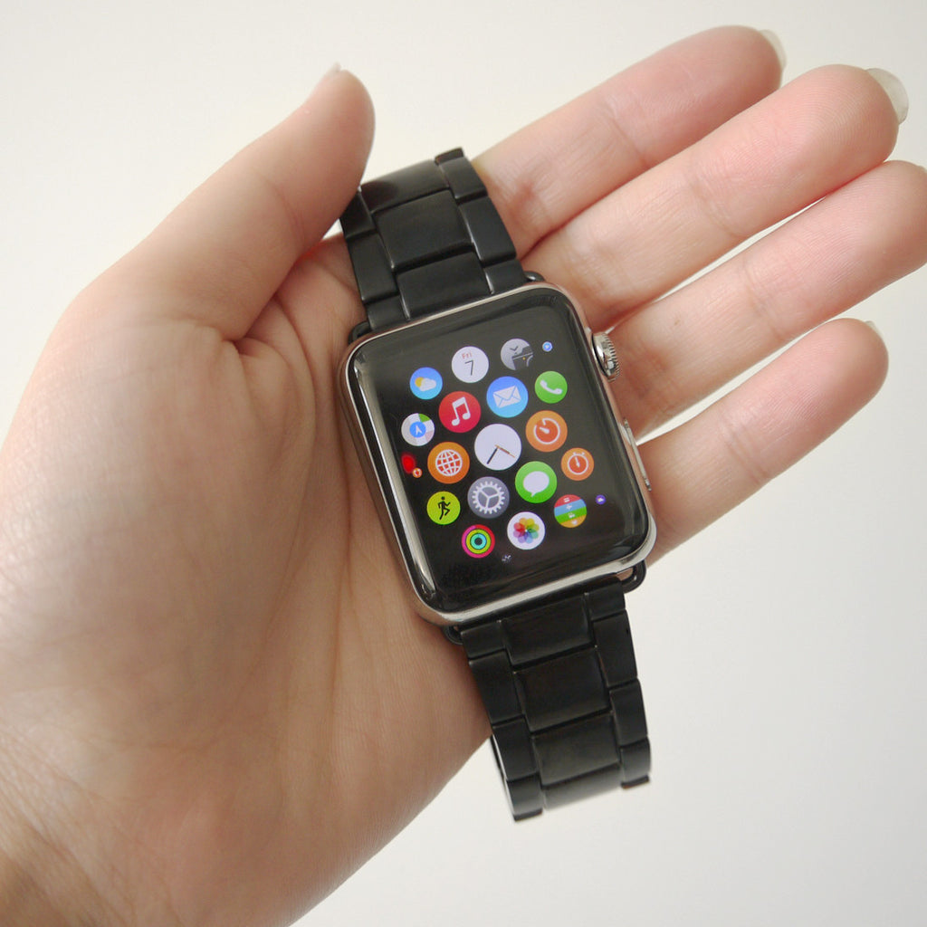 space gray apple watch with silver band