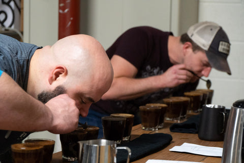 Adam Walsh and Nick Berardi cupping coffee at Utopian Roastery