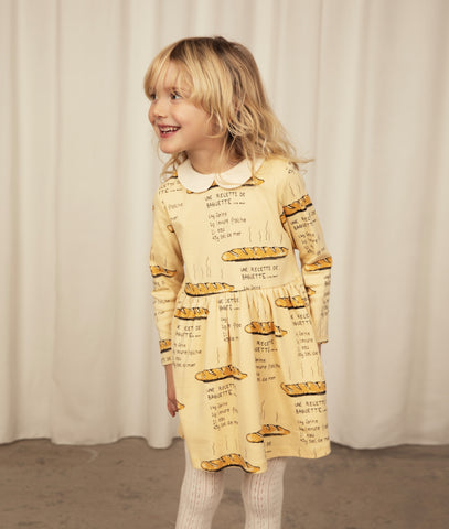 Little girl wearing Mini Rodini baguette print dress