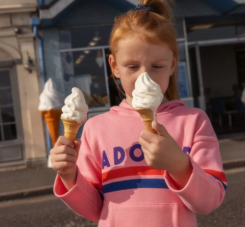 Little girl eating ice cream in adored collection by mini rodini