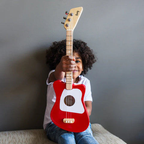 Gifts that Rock child with loog guitar