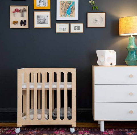 Oeuf Fawn Bassinet in a room