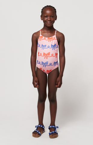 girl wearing ribbon bow bathing suit by bobo choses