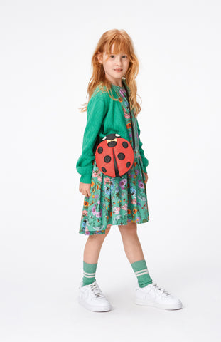 Girl with ladybird bag by Molo