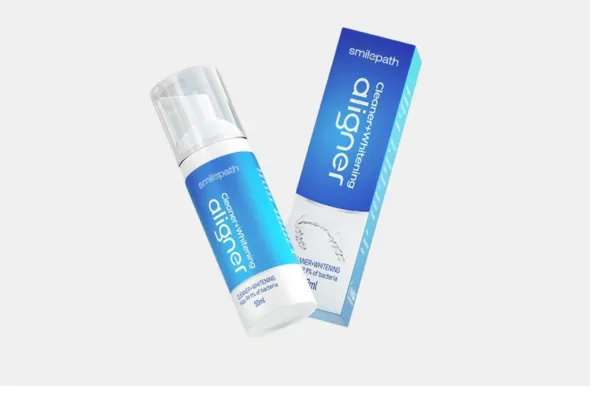 A Smilepath Aligner Cleaner + Whitener bottle with its box.