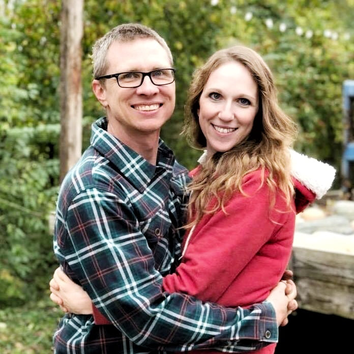 Julie Kreke and husband hugging each other