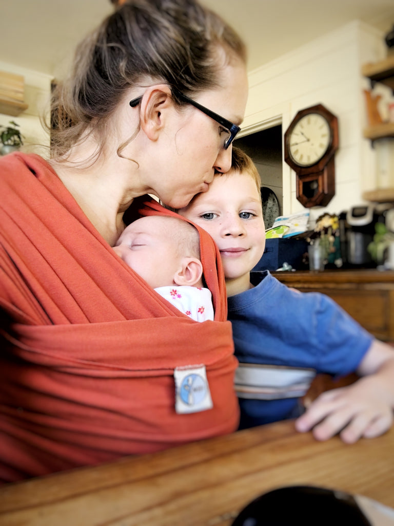 Julie Kreke with baby and kid