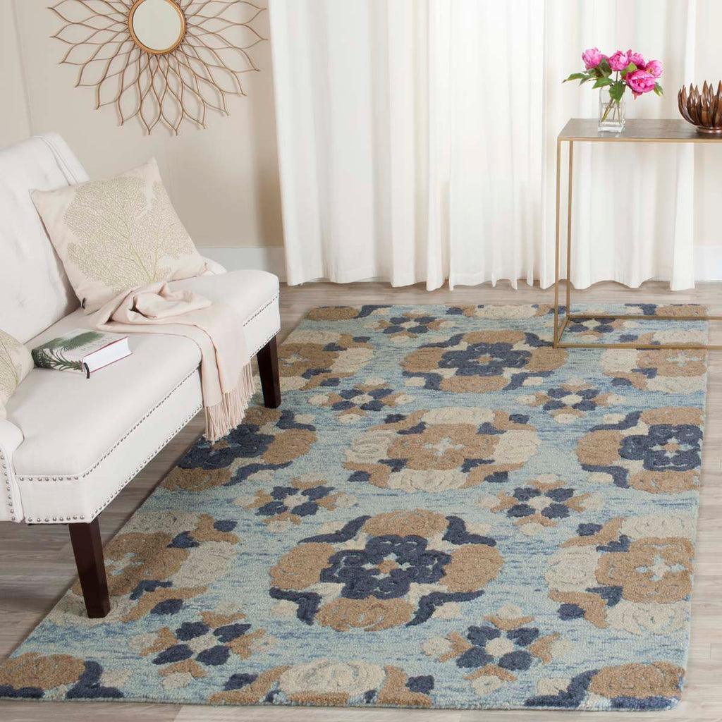 SAFAVIEH Blossom BLM421B Handmade Ivory / Teal Rug 5' x 8', 5' x 8' -  Baker's