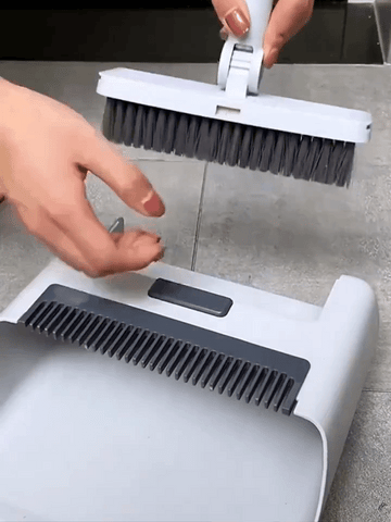 Person showing the brush bristles of the 180° Rotating Head Broom Dustpan Set