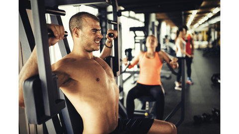 man pushing limits in gym