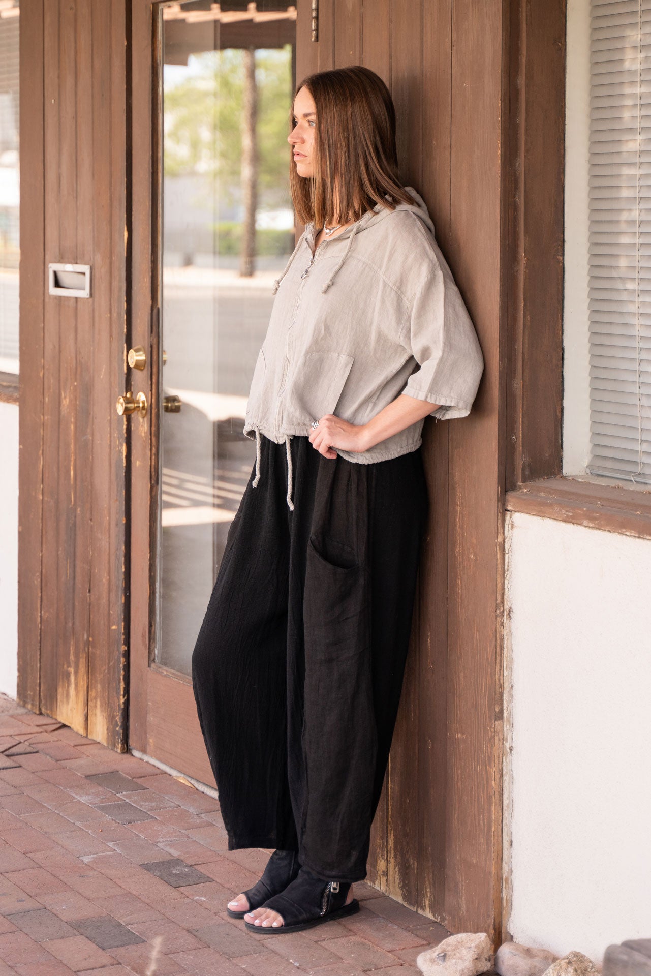 Conscious Coterie blog post Mastering the Summer to Fall Fashion Transition blog post image of a woman wearing a linen jacket and pants